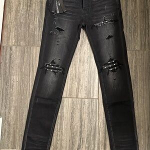 AMIRI Black Distressed Skinny Jeans